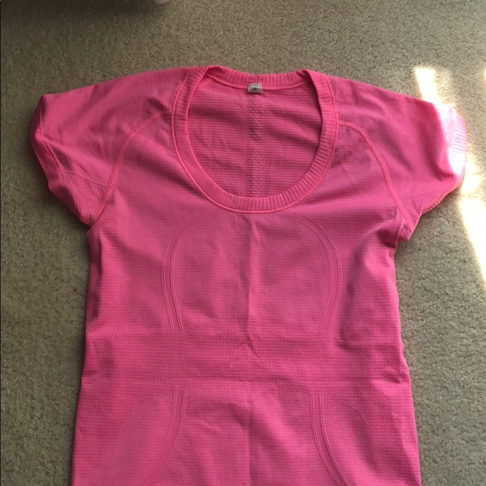 Pink lululemon workout shirt